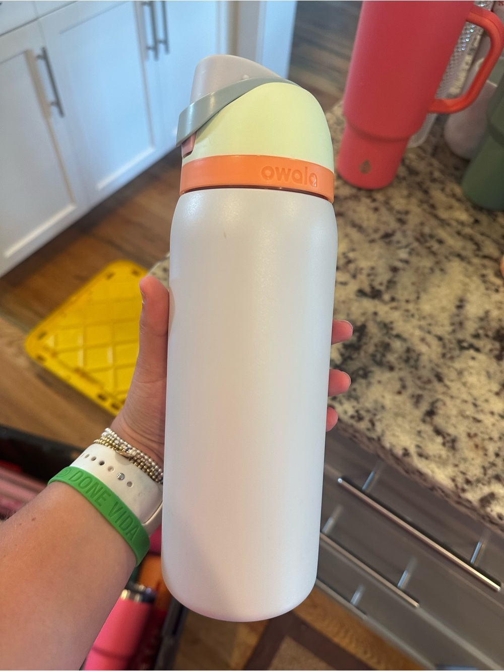 Owala blue Stainless Bottle with Pastel Yellow Lid and Orange Accent